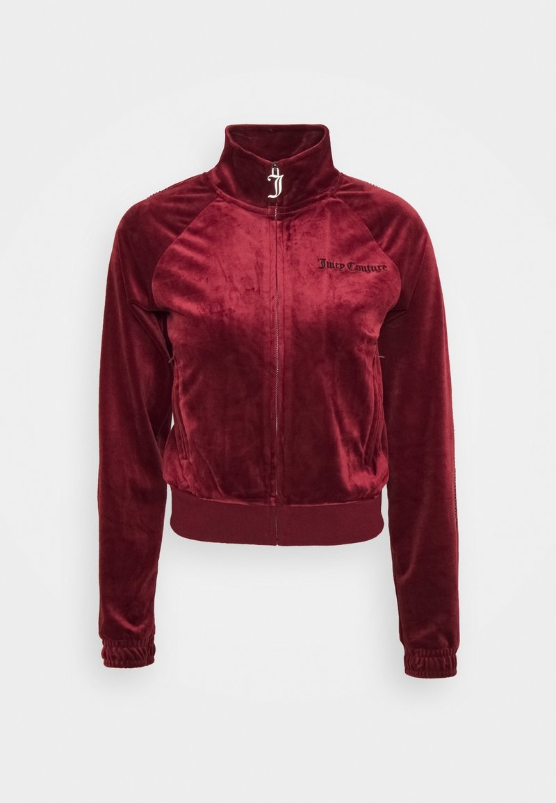 Veste zippée en velours bordeaux avec col montant, poignets élastiques et "Juicy Couture" brodé sur la poitrine gauche.