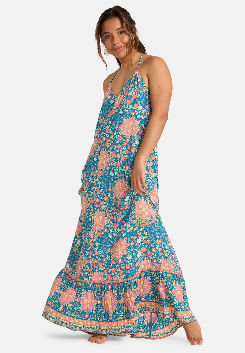 Maxi-jurk met een levendig bloemmotief in teal, roze en oranje. Heeft verstelbare schouderbanden en een gerimpelde zoom.