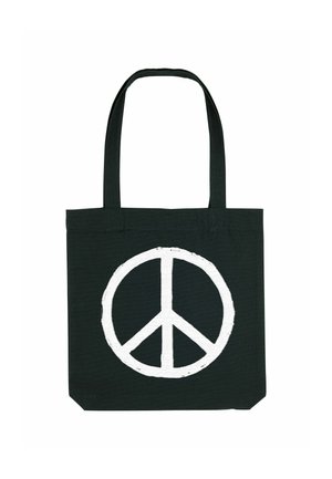 Borsa in cotone nera con un grande simbolo della pace bianco al centro. Ha manici lunghi e robusti per il trasporto.
