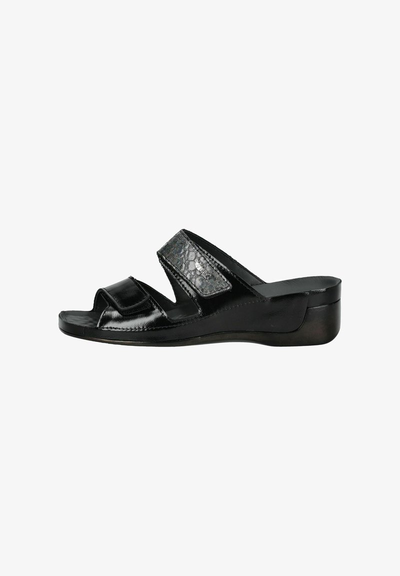 Black slide sandals with a glossy patent finish, featuring two wide straps and a textured accent. Comfortable wedge sole provides support.