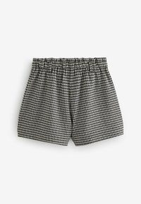 Sort-hvidt houndstooth-mønstret shorts med elastisk talje, løs pasform og glat stof tekstur.