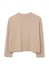 Maglione beige a maglia con vestibilità rilassata, maniche raglan, orlo a costine e una texture morbida. Il design presenta una lunghezza leggermente accorciata.