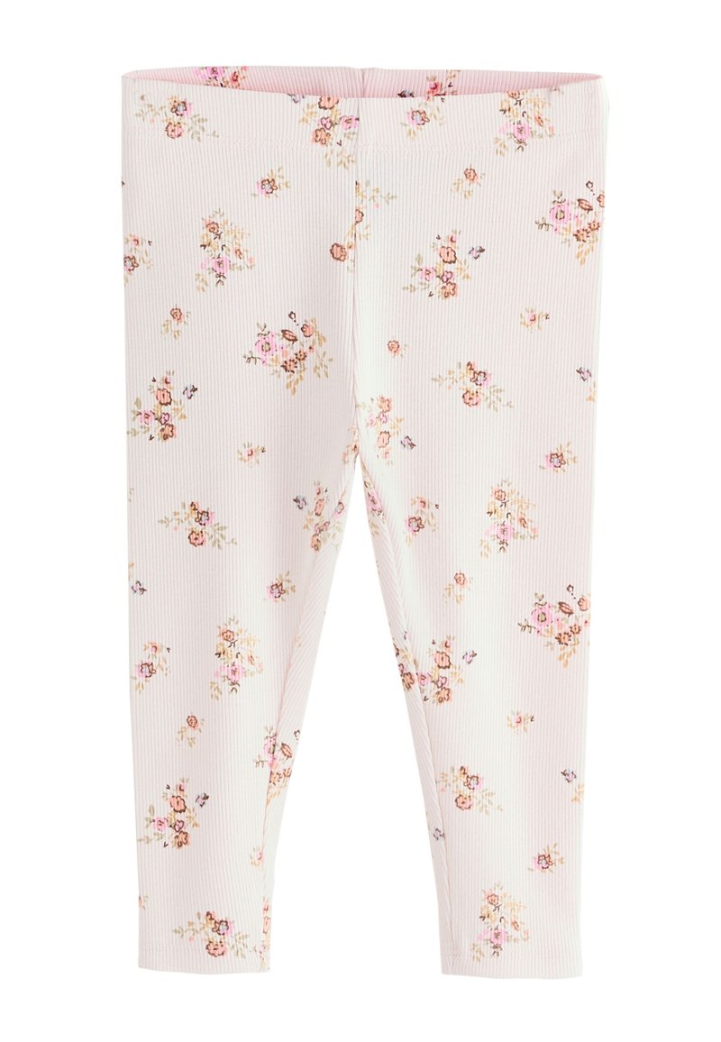 Õielised retuusid soonikkoes kangast, millel on heleroosa taust väikeste, hajutatud õiekujunditega pehmetes toonides.