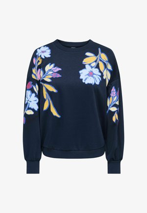 Sweat-shirt bleu marine avec imprimés floraux en bleu clair, rose et jaune. Tissu doux, encolure ronde et poignets côtelés avec une coupe décontractée.