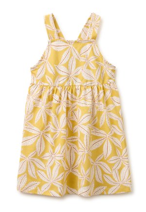 Robe jaune sans manches pour tout-petit avec motif de feuilles blanches et marron et taille froncée, à plat sur fond blanc.