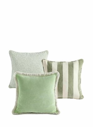 Three decorative square cushions in green tones, one solid with fringe, one with vertical stripes, and one with a subtle floral pattern.
