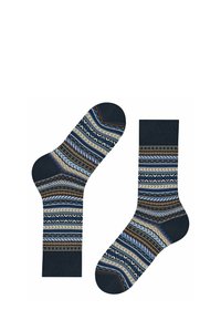 Calze blu a fantasia con disegni zigzag e geometrici in beige, marrone e blu navy. Realizzate in tessuto con bordo a costine.