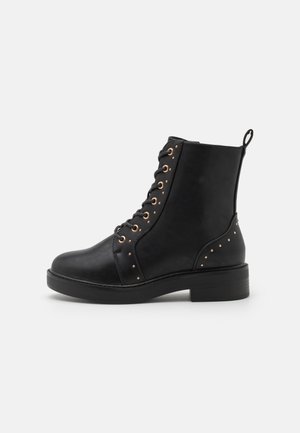 Bottines à lacets - black