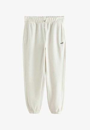 Hvide fleece joggere med elastisk talje, snøre, to sidelommer og et lille broderet logo på venstre hofte.