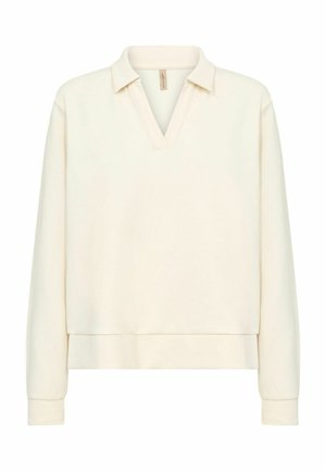 Jersey de color beige claro con cuello en V y cuello corto, con mangas largas y dobladillo acanalado. Hecho de tejido suave con una textura lisa.