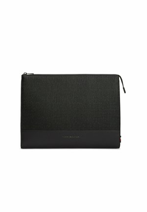 Black textured rectangular pouch with zipper closure and small Tommy Hilfiger logo on the lower front panel.