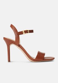 Brown leather high-heeled sandal with a sleek design, adjustable ankle strap, and subtle gold buckle accent. Open-toe and smooth texture.
