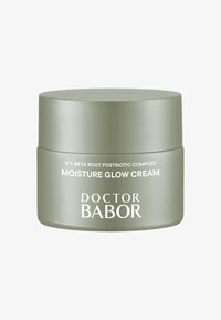 Bocal rond vert clair avec une finition mate lisse. Texte blanc affichant "DOCTOR BABOR" et "MOISTURE GLOW CREAM" à l'avant.