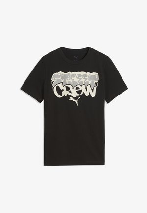 T-shirt noir à manches courtes avec texte style graffiti "Street Crew" et logo Puma centrés sur la poitrine.