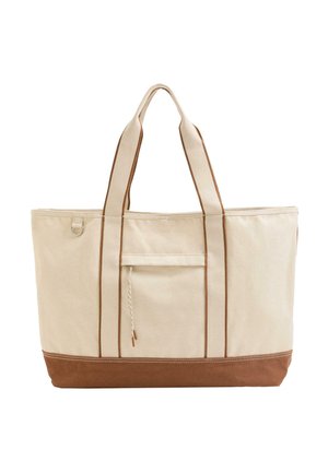 Velika bež platnena torba z rjavim podstavkom, dvema ročajema, sprednjim žepom z vrvico za zategovanje in kovinskim obročkom na strani.