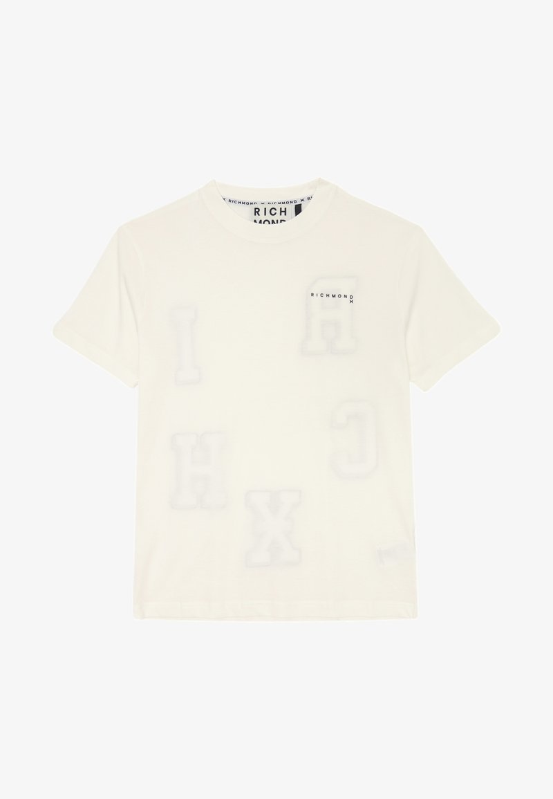 T-shirt bianca in cotone con lettere sovradimensionate e in rilievo "I", "H", "C", "X" e "A" con una finitura lucida e discreta. Logo del brand in piccolo sul petto.