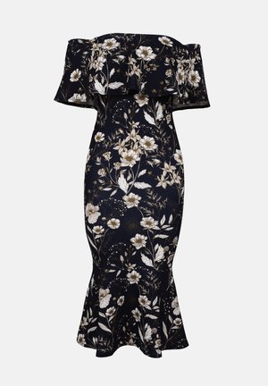 Off-shoulder maxikjole i marineblå med hvite og gull blomster mønster. Tettsittende silhuett med blaffende kant, laget av glatt, elastisk stoff.