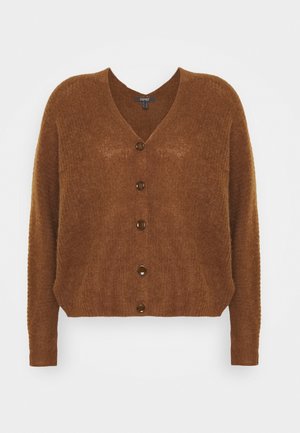 Brown, short-sleeve cardigan with a V-neck, featuring a loose fit, textured knit, and six large, round buttons down the front.
