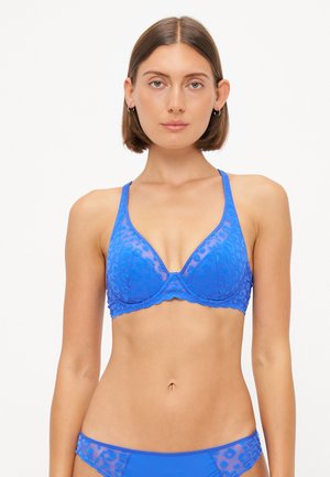 Blue lace bralette with a leopard print design, featuring a plunging neckline, scalloped edges, and adjustable straps. Soft, semi-sheer texture.