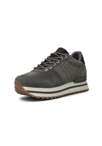 Gray suede sneaker with a thick white midsole, textured black heel, and ridged brown outsole. Features silver eyelets and flat laces.