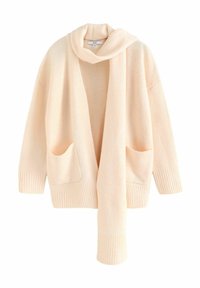 Licht perzikgekleurde gebreide cardigan met een omslagkraag, open voorkant, geribbelde manchetten en twee voorzakken. Zachte textuur, losvallend ontwerp.