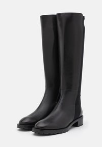 Bottes noires en cuir hauteur genou avec une finition lisse, une semelle en caoutchouc robuste et des panneaux latéraux élastiques pour un ajustement parfait.