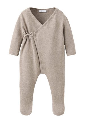 Grenouillère beige en tricot pour bébé, manches longues, jambes avec pieds et fermeture à nouer sur le côté de la poitrine.
