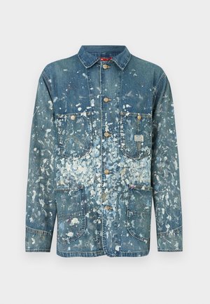 Világoskék árnyalatú farmerdzseki festékspricc mintákkal, hegyes gallérral, két első zsebbel és arany gombokkal.