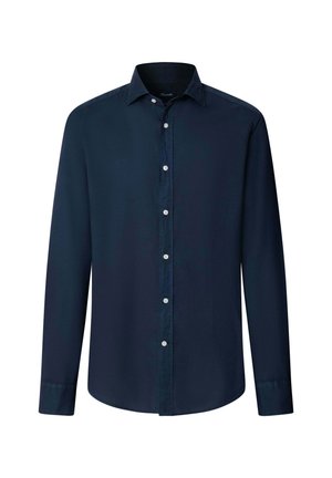 Chemise pour homme à manches longues de couleur bleu marine foncé, à boutons blancs et col, présentée sur un fond blanc uni.