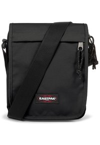 Borsa a tracolla nera in tessuto con tracolla regolabile, dotata di patta pieghevole, tirazip in argento e patch con logo Eastpak sul davanti.