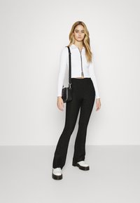 Tommy Jeans PARTY  - Calças - black