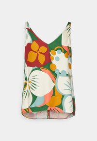 Top floral sans manches avec un col en V, présentant des motifs multicolores de feuilles et de fleurs sur un fond crème. Ourlet irrégulier.