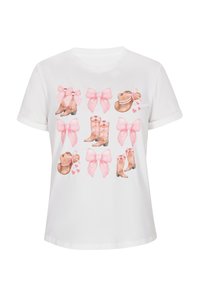 Hvid bomulds-t-shirt med lyserøde illustrerede støvler og sløjfer, arrangeret i et gittermønster med hjerter. Korte ærmer, afslappet pasform.
