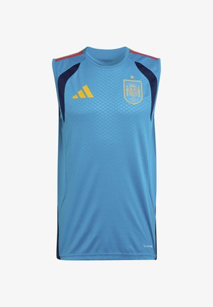 Jasnoniebieski bezrękawnik piłkarski z żółtymi akcentami, z herbem reprezentacji Hiszpanii i logo Adidas z przodu.