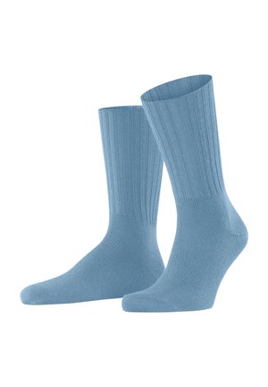 Light blue cotton socks with a ribbed texture and medium-length design, featuring reinforced heel and toe for durability.