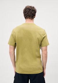Klättermusen ROOT LOGO TEE - T-shirt básica - meadow green