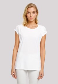 White cotton t-shirt with short rolled sleeves, a crew neck, and a relaxed fit, featuring a smooth texture and no visible patterns.