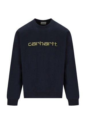 Sweat-shirt Carhartt bleu marine à manches longues et poignets côtelés, avec un grand logo Carhartt jaune-vert sur la poitrine.