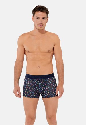 Boxershorts aus dehnbarem Material mit einem marineblauen Grundton und bunten Handabdrücken. Elastischer Bund mit sichtbarem Branding oben.