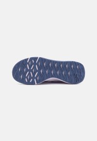 Shoe outsole featuring a textured rubber sole in navy blue with a geometric pattern and a subtle white accent along the edge.