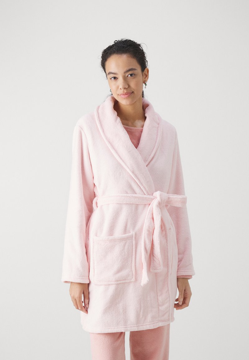 Light pink fleece bathrobe with a shawl collar, tie belt, and front pocket, featuring a soft texture and knee-length design.
