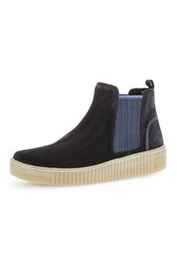 Schwarze Wildleder Chelsea-Boots mit blauen elastischen Seitenpaneelen, strukturierten Gummisohlen und Zugschlaufe hinten für ein einfaches Anziehen.