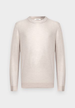 Lys beige crewneck sweater lavet af blødt strikstof med lange ærmer og ribbede manchetter og kant. Minimalistisk design, glat tekstur.