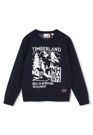 Pull Timberland bleu marine avec motif blanc de cabine, arbres, montagne, texte "NH USA 1973" et "Built to withstand the elements."