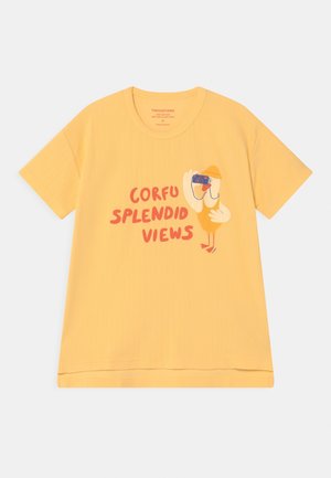 Yellow short-sleeve t-shirt with red text "Corfu Splendid Views" and an illustration of a bird holding a camera.