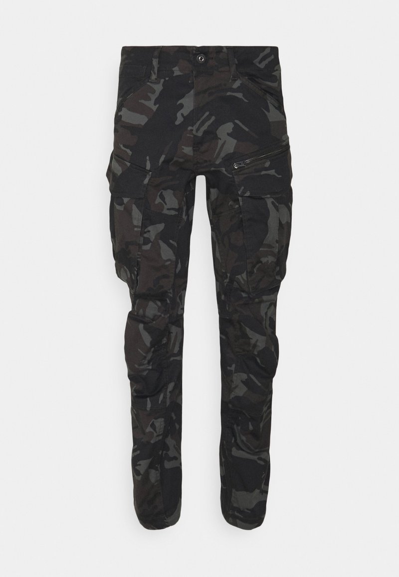 Pantalones cargo camuflaje negro con un bolsillo con cremallera, múltiples bolsillos laterales y un diseño ajustado con una textura de tela suave.
