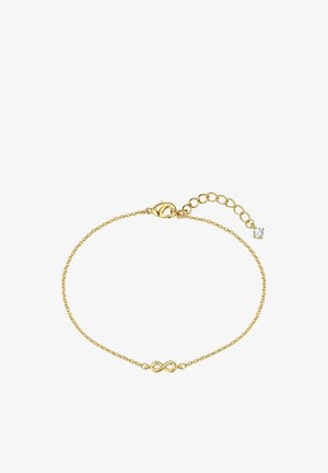Pulsera delicada de cadena de oro con un colgante de símbolo de infinito y cierre ajustable con una pequeña piedra clara en el extremo.
