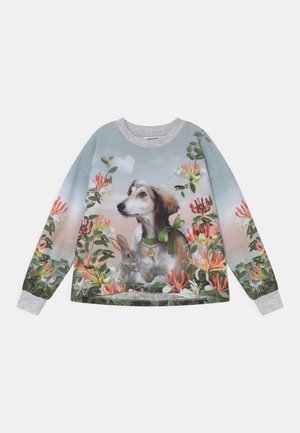 Sweatshirt med blomsterprint, med en hund iført en grøn halsbånd og en kanin, omgivet af farverige blomster mod en blød himmelbaggrund.