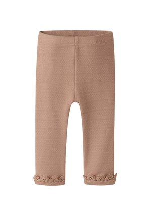 Beige Leggings mit strukturiertem Muster und einer Spitzenkante am Saum. Hergestellt aus weichem, elastischem Material, für Komfort und Passform entworfen.
