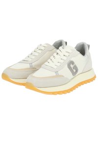Sporty sneakers in white leather and grey suede with a textured logo detail. Features a thick yellow rubber sole and flat laces.